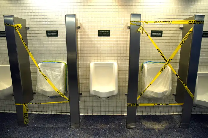 Urinals are taped-off in observance of social distancing regulations on September 11th, 2020 in New York City.